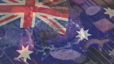 Avustralya 'nın kalitesini göstermek için dijital harita titreşimi gibi sallanan biftek ve sebzelerin üzerine bayrak çekiliyor. Izgara, barbekü, aşçılık, gurme, açık hava, dijital, bağlantı