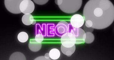 Neon metin ve yeşil çubukların ortaya çıkmasıyla koyu renk değişimi, bokeh küreler işaretin altını çizmek için sürükleniyor. Neon, soyut, parlak, fütürist, dijital, canlı, hareketli
