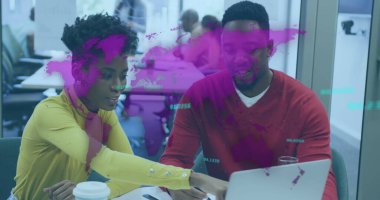 Office team pointing at laptop and reviewing data in meeting room, with digital map overlay. Collaboration, teamwork, brainstorming, digital, corporate, communication, innovative