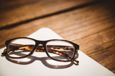 Close-up of eyeglasses on table at home