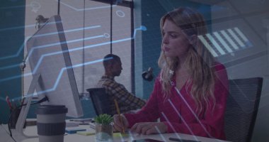 Writing woman wearing red blouse taking notes at office desk, with notebook and overlay, copy space. Corporate, teamwork, productivity, innovation, modernity, technology, communication