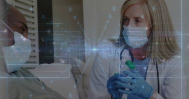 Female doctor holding vial with green cap explaining treatment by hospital bed, with digital data. Medical, healthcare, clinical, diagnostic, futuristic, professional, patient care