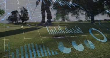 Golfer in polo shirt viewing digital overlays on putting green, with golf ball and putter. Sports, professionalism, analytics, precision, outdoor, leisure, performance