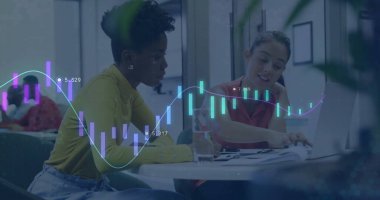 Two female coworkers pointing at charts while typing on laptops in office lounge, financial overlay. Collaboration, teamwork, modern, professional, brainstorming, analytics, workspace