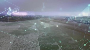 Dijital ağ kumsalda kayboluyor, titreşen düğümler ve kıyı bağlantısını gösteren çizgiler. Fütürist, teknoloji, soyut, bağlantı, kentsel, gösterişli, yenilikçi