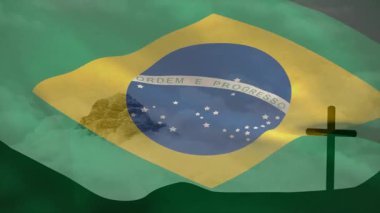 Brezilya bayrağını sallayan rüzgar statik haçın yanında sürüklenen yıldızlar vatanseverliği çağrıştırıyor. Vatanseverlik, milliyetçilik, sembolizm, manzara, miras, birlik, dayanıklılık