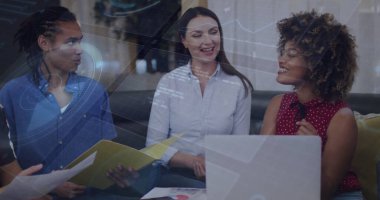 Sitting on sofa, three colleagues reviewing reports in office lounge, with laptop, folder, pen. Collaboration, teamwork, modern, professional, casual, communication, brainstorming