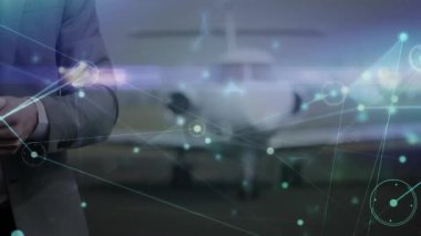 Kurumsal havacılık yöneticisi akıllı telefon yetiştiriyor ve jete bağlı animasyon düğümlerini açıyor. Lüks, teknoloji, yenilik, bağlantı, şirket, modern, iş