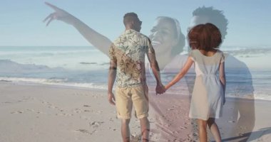 Kesişen örtüler, okyanus kıyısında el ele yürüyen ve seyahat reklamları için iz bırakan çiftleri gösteriyor. Romantizm, bağlantı, sükunet, macera, eğlence, uyum, eğlence kıyafeti