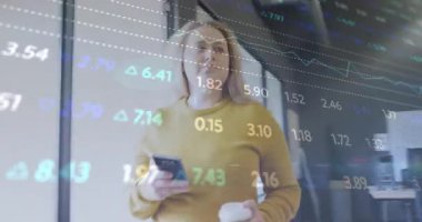 Woman in office scrolling smartphone, activating stock overlay then man typing and analyzing charts. Corporate, professional, digital, productivity, modern, observational, analytical