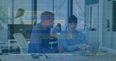 Reviewing documents office colleagues pointing at laptop and typing in office, with papers. Collaboration, teamwork, corporate, modern, productivity, workspace, discussion