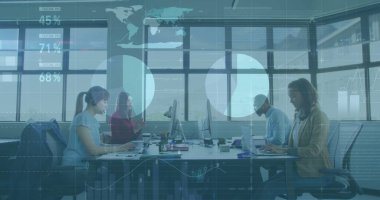 Collaborating group of professionals analyzing metrics at office table with laptops and overlays. Collaboration, teamwork, analytics, productivity, modernity, technology, business