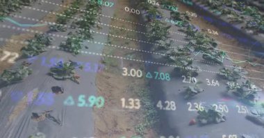 Kamera çilek büyüme eğilimlerini gösterirken, veriler güncelleme değerlerinde kaybolan verileri örtüyor. Hassas tarım, mahsul izleme, veri görselleştirme, sera teknolojisi, sürdürülebilirlik, yüksek teknoloji çiftçiliği, bahçecilik