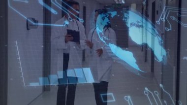 Doctors entering hospital hallway while tapping tablet and viewing hologram data updating. Medical, technology, futuristic, professional, innovation, digital, collaboration
