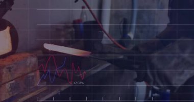 Industrial blacksmith withdrawing bar from forge forging blade on anvil with data graphs animating. Craftsmanship, metalwork, industrial, workshop, precision, warmth, strength