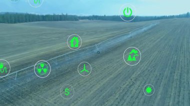 Dönüştürme simgesi görünen simgeler sürükleniyor ve pivot sulama etrafında kaynakları gösteriyor. Sürdürülebilirlik, tarım, yenilenebilir, çevre dostu, teknoloji, enerji, çevre