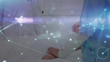 Hemşireler battaniyeye sarılıp giriyorlar. Doktor veri örtüsü altında rehberlik ederken koruma başlatılıyor. Tıbbi, sağlık, dijital, işbirliği, hasta bakımı, yenilik, klinik