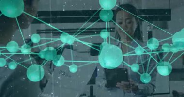 tech demonstrator tapping tablet and dragging holographic nodes initiating network shift in lab. Technology, innovation, connectivity, holography, digital, futuristic, data