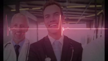 Hemşire tıbbi ekibin yanından geçti, odaklanmayı değiştirdi, ECG darbesiyle liderliği vurguladı. Sağlık, takım çalışması, profesyonellik, klinik, canlılık, tanı, tıbbi