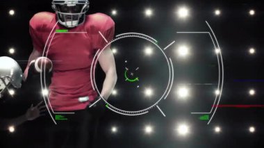 Dijital reticle ışıkların altında ona kilitlenirken, futbolcu ileri sert silahlanma savunucusuna güç veriyor. Sporcu, spor, aksiyon, rekabet, yoğunluk, hareket, stadyum