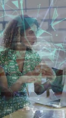 Animation of network of connections with data over business people. Global computing, business, finance and data processing concept digitally generated video.