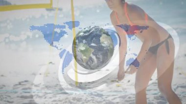 Voleybol oyuncusu ralliyi sürdürmek için kazı yaparken dönen topa dönüşüyor. Global, spor, dinamik, macera, eğlence, enerji dolu, açık hava