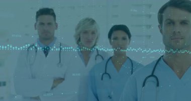 Koridordaki tıbbi ekibe doğru ilerleyen kamera veri dalgası renklendirme merkezi doktorunu canlandırıyor. Tıbbi, sağlık, takım çalışması, işbirliği, profesyonellik, tanı, yenilik