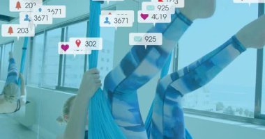 Animasyon sosyal medya nişan ikonlarıyla ipek tutan ve sağlık için ters çeviren havadan yoga. Fitness, sağlık, akrobasi, esneklik, güçlendirme, stüdyo, modern