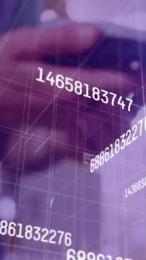 Animation of numbers and data processing over close up of a hand using phone to make a payment. Digital payment and business technology concept