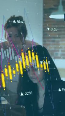 Animation of financial data processing over diverse business people in office. Global business, finances, computing and data processing concept digitally generated video.