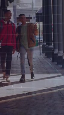 Animation of financial data processing over diverse people walking on street. Global lifestyle, finances and digital interface concept digitally generated video.
