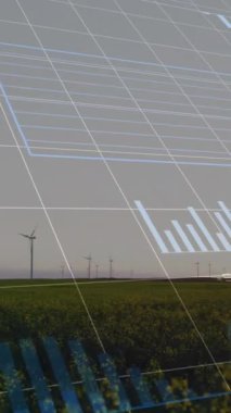 Yeşil alandaki yel değirmeninin hızlandırılması sırasında grafiklerin ve değişen sayıların animasyonu. Dijital bileşik, çoklu pozlama, rapor, iş dünyası, çevre, teknoloji, sürdürülebilir konsept.