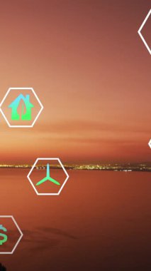 Animation of sustainability and ecology icons over landscape. Ecology, sustainability and data processing concept digitally generated video