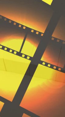 Animation of film tape and countdown on yellow background. Global business, technology and digital interface concept digitally generated video.
