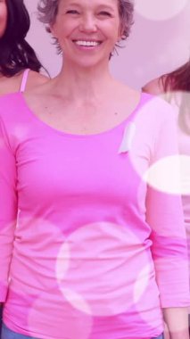 Işıkların animasyonu farklı gruplardaki mutlu kadınların üzerinde. Göğüs kanseri pozitif farkındalık kampanyası konsepti dijital olarak oluşturuldu.