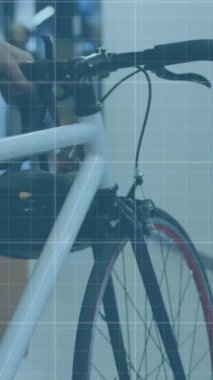 Animation of data processing over asian businesswoman working at office. Global business and digital interface concept digitally generated video.