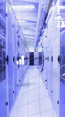 Animation of icons and data processing over server room. Global technology, computing and digital interface concept digitally generated video.