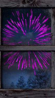 Renkli Noel ve yeni yıl havai fişekleriyle dolu bir pencere animasyonu. Noel, yeni yıl, kutlama ve gelenek konsepti dijital olarak oluşturulmuş video.