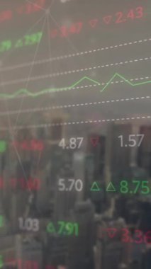 Animation of financial data processing over cityscape with modern office buildings. Global business, finance, computing and data processing concept digitally generated video.