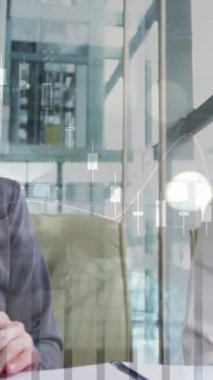 Animation of data processing over caucasian business people at meeting. global business and digital interface concept digitally generated video.