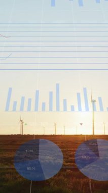 Rüzgar türbinleri üzerinde finansal veri işleme animasyonu. küresel çevre, sürdürülebilirlik ve finans kavramı dijital olarak oluşturulmuş video.