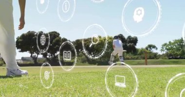 Bovlingçi, performansını sergileyen vurucunun etrafında dönen spor analizi ikonlarıyla koşmaya başlıyor. Kriket, atletizm, spor, yarışma, açık hava, performans, dijital