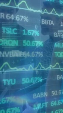 Animation of financial data processing over businesses people. global business, finances, data processing and digital interface concept digitally generated video.