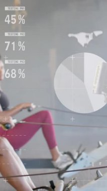 Beden eğitiminde kürek çekme makinelerinde çeşitli gruplar üzerinde veri işleme arayüzü üzerinde animasyon. Fitness, egzersiz, güç, veri, dijital arayüz ve dijital olarak üretilen video.