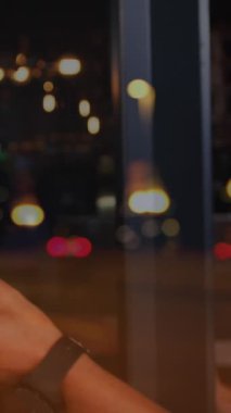 Animation of spots of light over man working in cafe. Global networks, business, finance, computing and data processing concept digitally generated video.