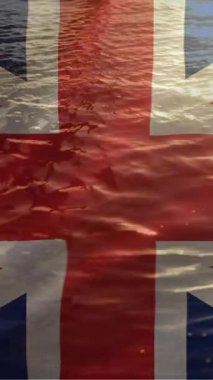 İngiliz bayrağı dijital bileşik arka planda akan su huzurlu sahne ile.