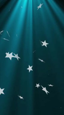 Mavi arkaplana düşen yıldızların ve karın animasyonu. Yeni yıl arifesi, parti, şenlik ve kutlama konsepti dijital olarak oluşturulmuş video.