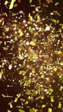 Altın konfetilerin düşüşünün animasyonu ve siyah arkaplanda ışık noktaları. parti ve kutlama konsepti dijital olarak oluşturulmuş video.