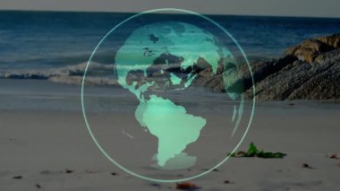 Başlangıçta dünya plajda dönerken, bir kadın seyahat haritası kullanarak akıllı telefonuyla önünden geçiyordu. Küre, sahil, seyahat, macera, keşif, gezinti, manzara