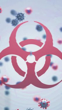 Şehrin yüzeyinde biyolojik tehlike işareti ve yüzen koronavirüs hücrelerinin canlandırılması. küresel covid 19 salgın konsepti dijital olarak oluşturulmuş video.